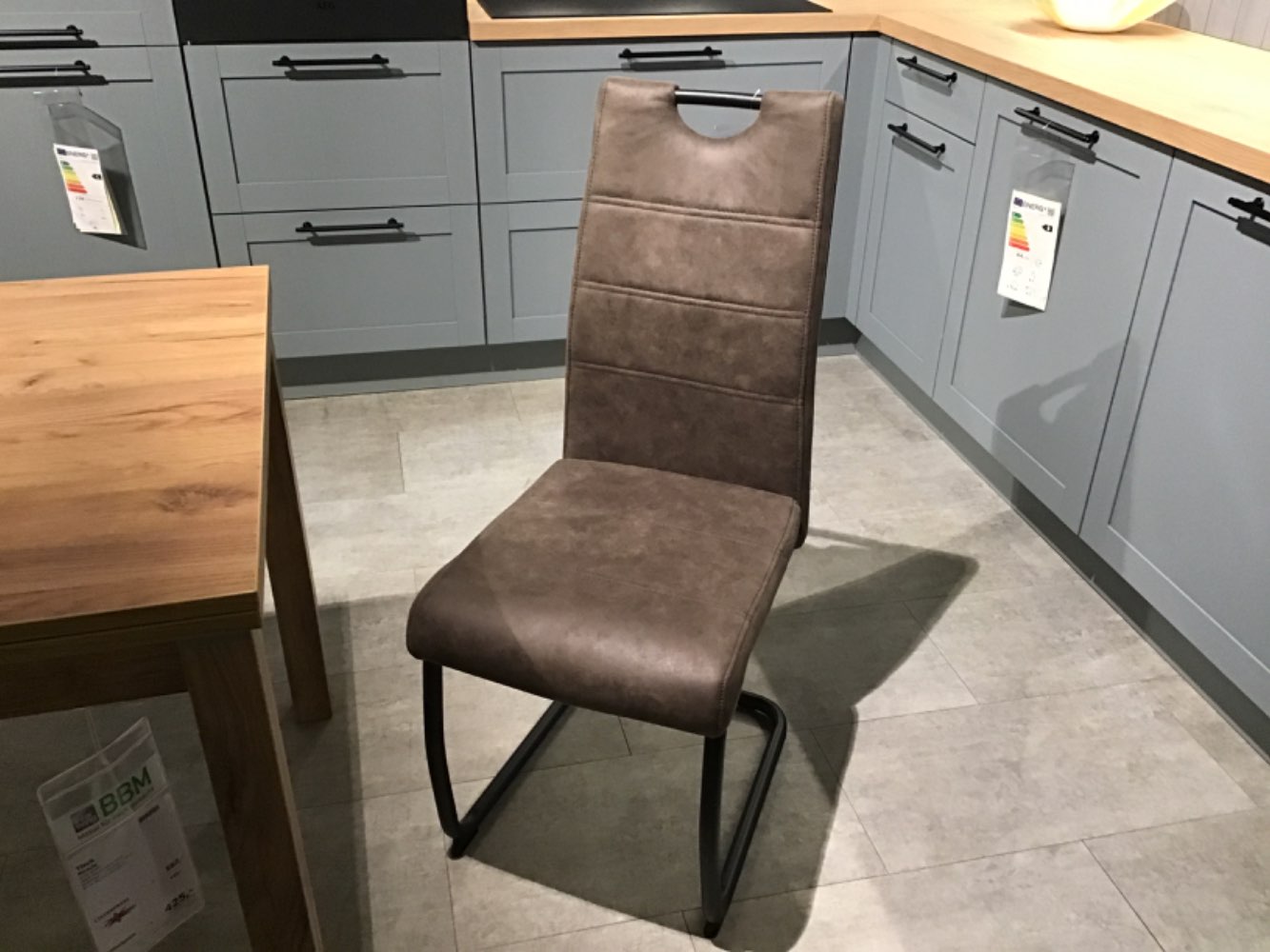 Schwingstuhl Bezug braun,Gestell schwarz 43x98x58cm