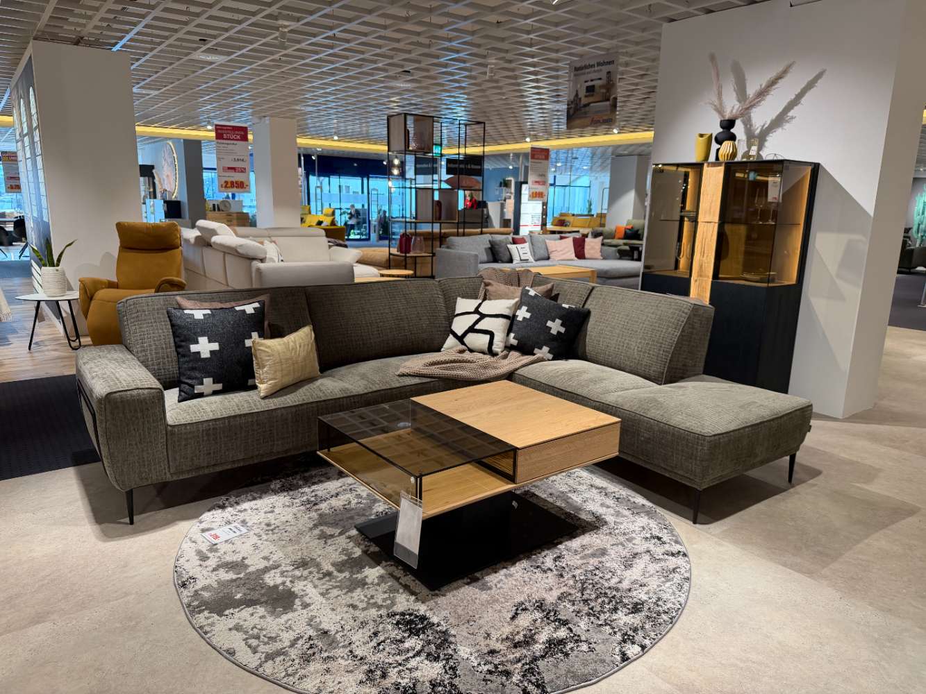 Polstergarnitur olive L-förmig, ca. 297×233 cm