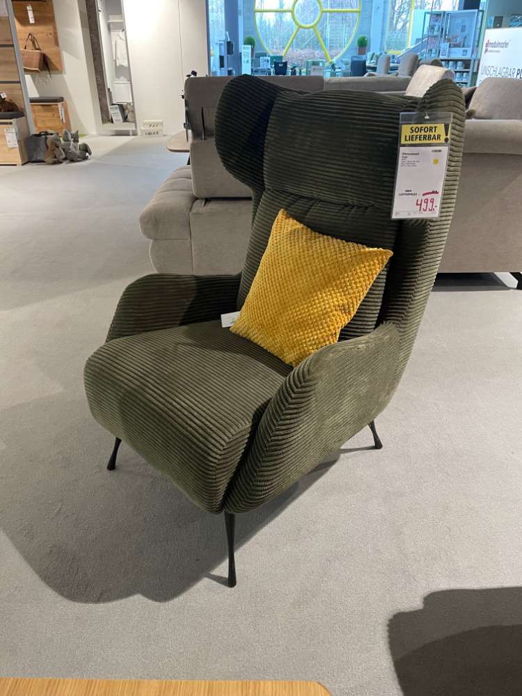 Ohrensessel in Cord grün