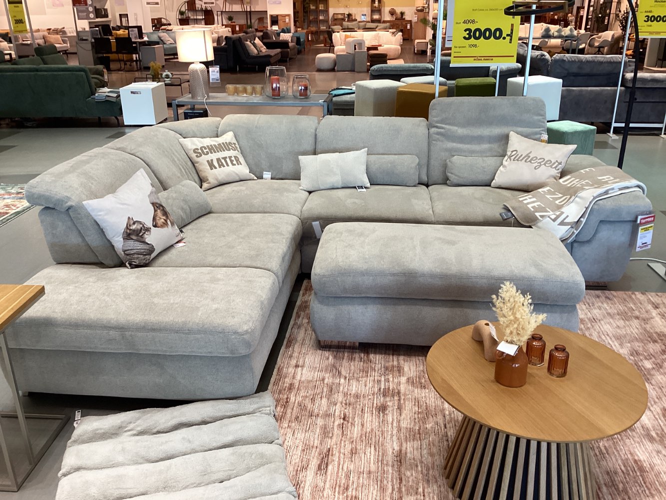 Ecksofa mit Hocker